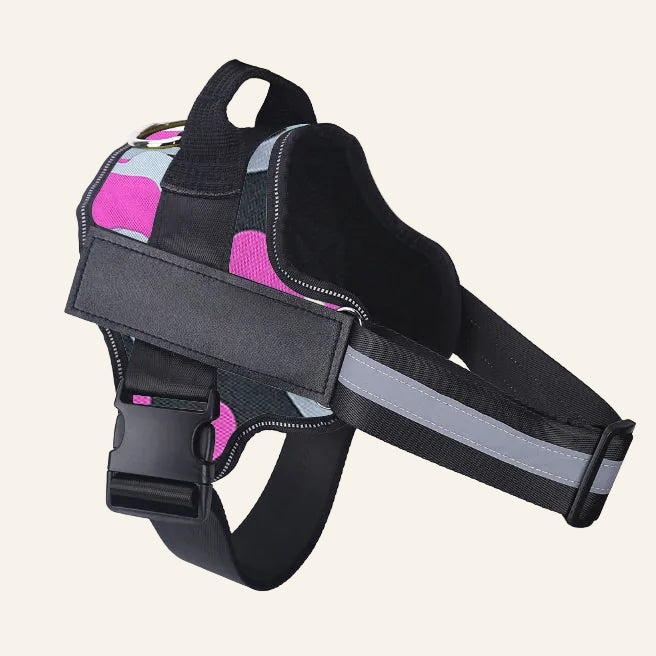 Black dog harness with reflective stripes on a white background